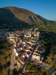 Fototapeta na wymiar Aerial view of Almudaina village with its church and the famous medieval tower , Alicante, Costa Blanca, Spain - stock photo