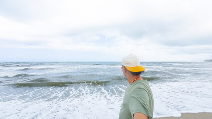 Contemplative Person Gazing at Ocean Waves