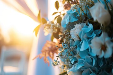  a bouquet of blue and white flowers in front of a window with the sun shining through the curtains behind it and a chair in the back of the room in the background.