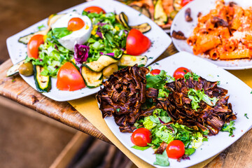 Travel in Italy, Part of Italian culture - healthy mediterranean italian food. Rome street restaurants with variety of typical traditional dishes