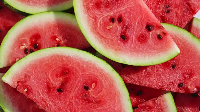 Fresh watermelon sliced in halves turn on isolated  white background for your top view design. Healthy fruit berries. Summer fresh fruit snack. 