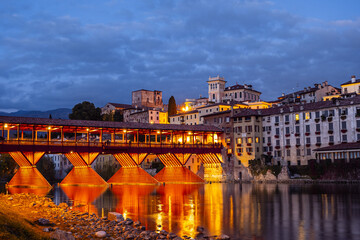 Fototapeta na wymiar Ponte degli Alpini, old bridge in the evening. Bassano del Grappa