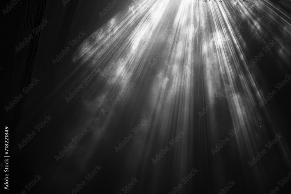 Poster a black and white photo capturing the sun shining through the clouds. perfect for adding a touch of 