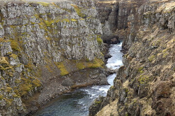 Kolugljúfur is a very pretty canyon located in the north of Iceland and known for its Kolufossar falls that flow to the bottom of the gorge