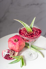 bright pomegranate juice with aloe vera, delicious alternative medicine