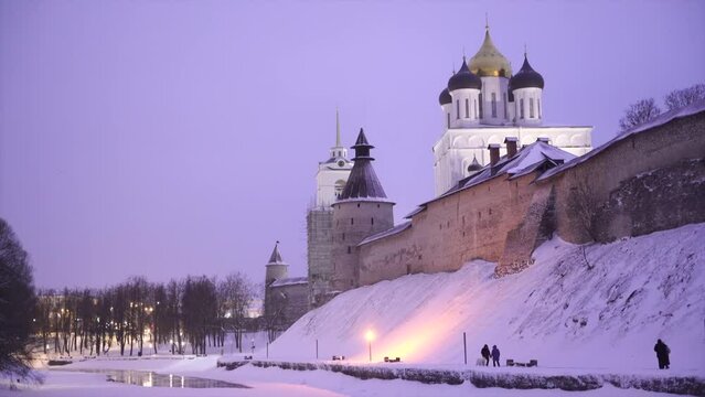  view of the Holy Trinity Cathedral in winter evening, snowfall. Pskov Kremlin