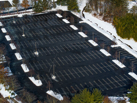 Vacant winter parking lot from an aerial view