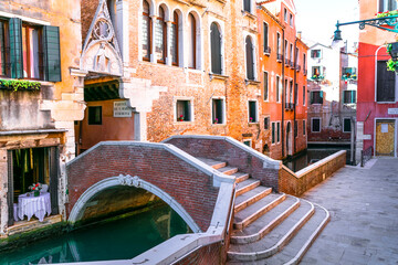 romantic Venetian streets and canals. Bridges of Venice town, Italy