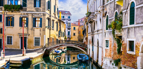 romantic Venetian streets and canals. Bridges of Venice, Italy. - obrazy, fototapety, plakaty