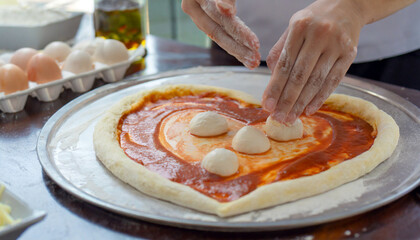 Obraz na płótnie Canvas Heart-shaped Pizza Dough Preparation