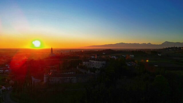 Sunset on the Friulian hills with a view of the Villalta castle. Fagagna.