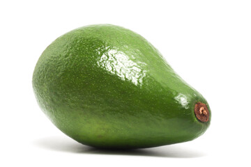 A whole fresh organic avocado delicious fruit side view isolated on white background clipping path