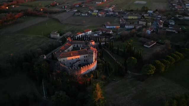 Sunset on the Friulian hills with a view of the Villalta castle. Fagagna.
