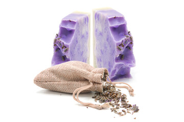 Lavender soap and rag sack with dried organic lavender flowers isolated on white background....