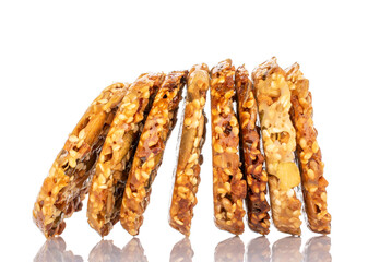 Several sweet Thaler cookies with nuts, macro, isolated on white background.