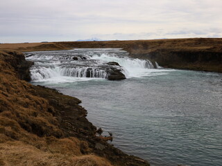 The Ægissíðufoss waterfall in Ytri-Rangá is a few kilometers further down the river from Hella