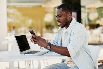 Fototapeta na wymiar Lifestyle man mobile sitting business young laptop phone communication male technology