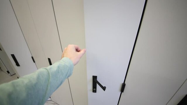 Man is closing storage at communications room in Moscow city telephone network.