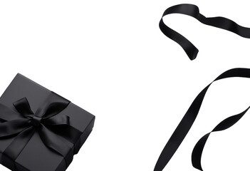 Obraz premium Blank open black present box or top view of black gift box with black ribbons and bow isolated on transparent background