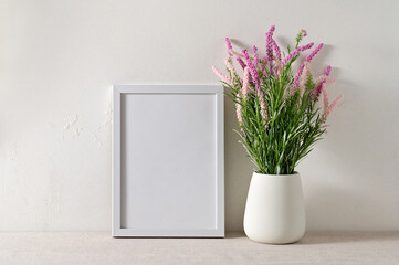 Aesthetic minimalist spring floral home interior decor, blank poster or picture frame mockup, pink...