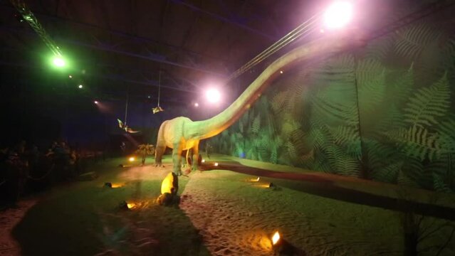 Robotic mamenchisaurus at Show of dinosaurs in pavillion of VDNKH