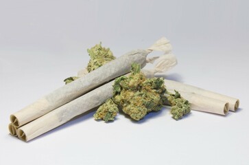 joint weed and marijuana buds isolated on white background THC cigarette isolated on white...