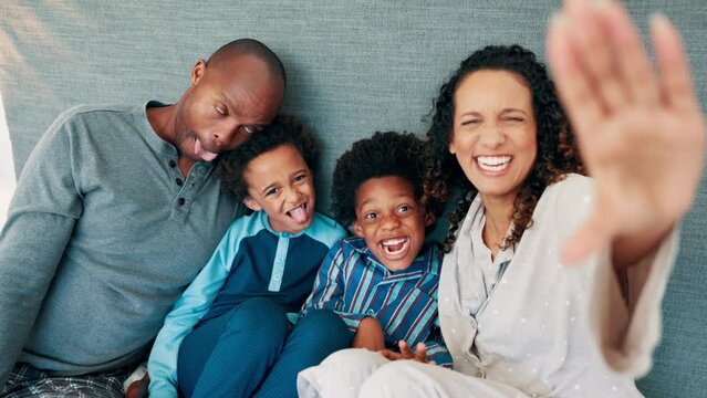 Parents, selfie and children on bed, funny face and laughing together for joke, memory and happy in home. African dad, mom and kids with photography, live streaming and comic video on social media