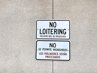 No Loitering, violators will be prosecuted sign - 718276063