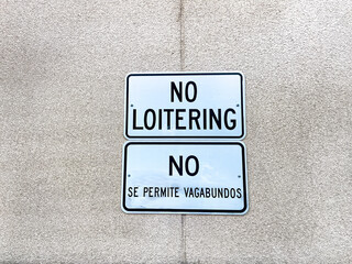 No loitering sign on a wall - 718276092