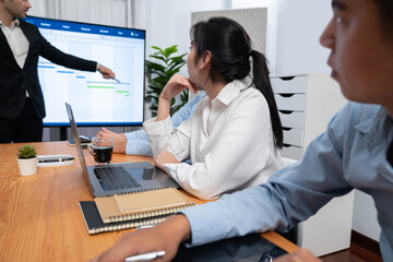 Project manager planning schedules for business task at meeting room, Gantt chart software show on...