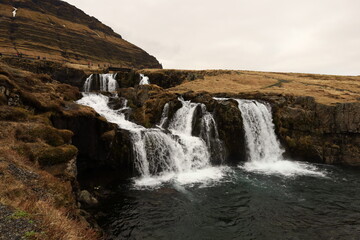 Kirkjufellsfossar is a waterfall in West Iceland on the Snæfellsnes peninsula