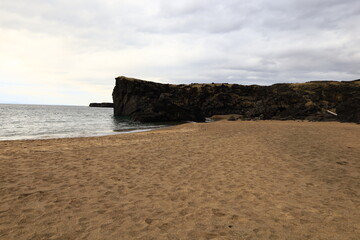Skarðsvík is a tiny and charming beach with huge basaltic rock formations and a golden sandy beach located in the Snæfellsjökull National Park