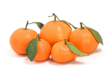 Group of fresh organic orange delicious fruit side view with green leaves isolated on white background clipping path