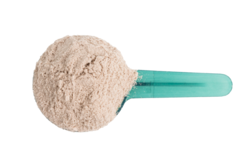 Chocolate whey protein powder in a plastic measuring spoon, isolated on transparent background, top view