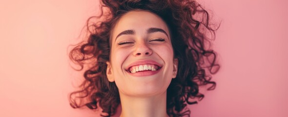  a woman smiling with her eyes closed and her hair blowing in the wind with her eyes closed and her eyes closed, with her eyes closed, on a pink background. - obrazy, fototapety, plakaty