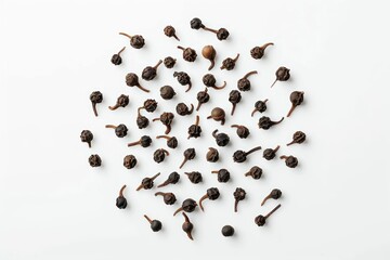 Black pepper and leaves on white background