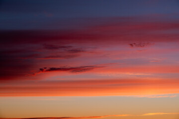 Fototapeta premium Deep red sunset in the clouds