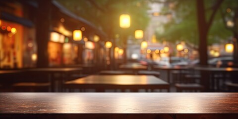 Product display template with bokeh background in a blurry restaurant with an empty table.