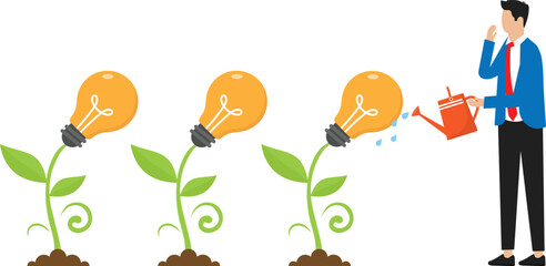 Creativity business growth concept, businessman watering plant with a light bulb on it creating ,creating a new solution ,business new ideas concept 