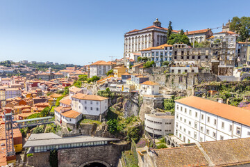 Aerial view of Ribeira, the Dom Luis bridge and the Douro river in Porto, Portugal