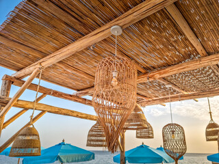 Bamboo lamps in a sea landscape - 718335044