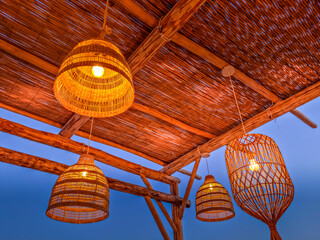 Bamboo lamps in a sea landscape