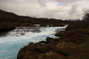 Brúará is a spring-fed river in West Iceland which runs by the boundaries of municipalities Biskupstungur and Grímsnes