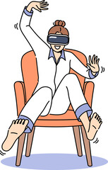 Woman wearing VR headset sits in chair and waves arms and legs, being immersed in virtual reality