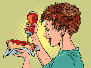 Delicious fast food and street food for all customers. A girl with a big appetite pours ketchup on a hot dog. Unhealthy food, but very tasty. Pop Art Retro - 718341617