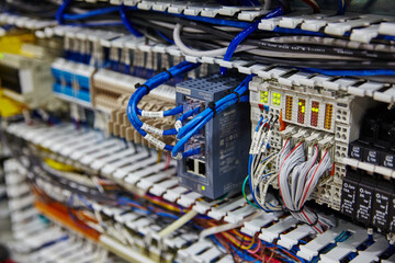 Industrial Ethernet Switch and Wiring Close-Up in Server Room - obrazy, fototapety, plakaty