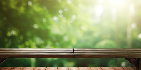 Wooden table top without objects, blurred curtain window and abstract green from garden with sunlight. Suitable for montage product display or design key visual layout.