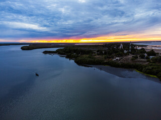Fototapeta premium sunset over the river