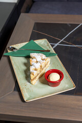 Apple pie served with vanilla ice cream