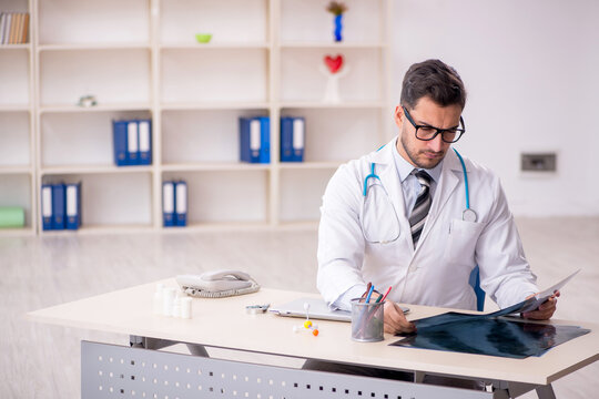 Young male doctor radiologist working in the clinic